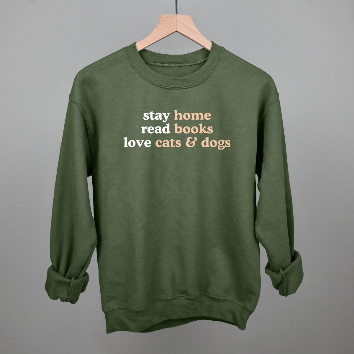 Stay Home Read Books Love Cats & Dogs graphic crewneck sweatshirt in Military Green