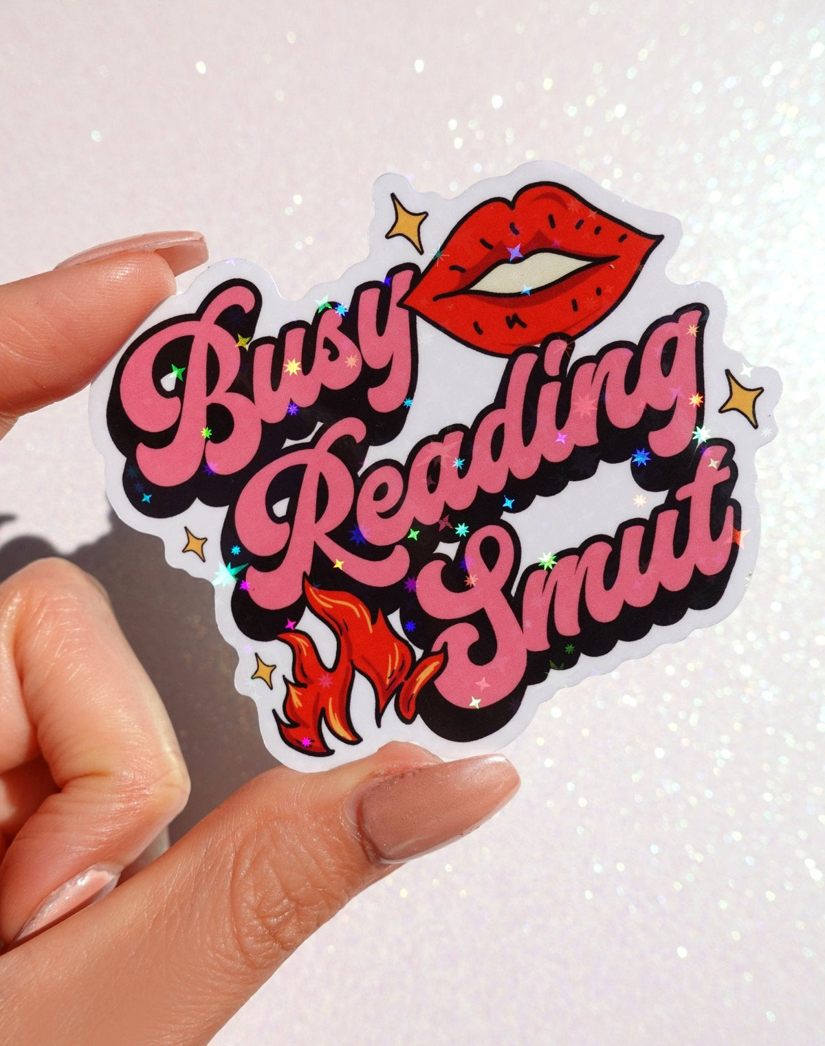 Funny Busy Reading Smut sticker with red lips, flames, and stars, glossy die-cut