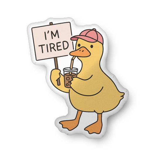 Duck custom-shaped pillow with “I'm Tired” sign, holding iced drink