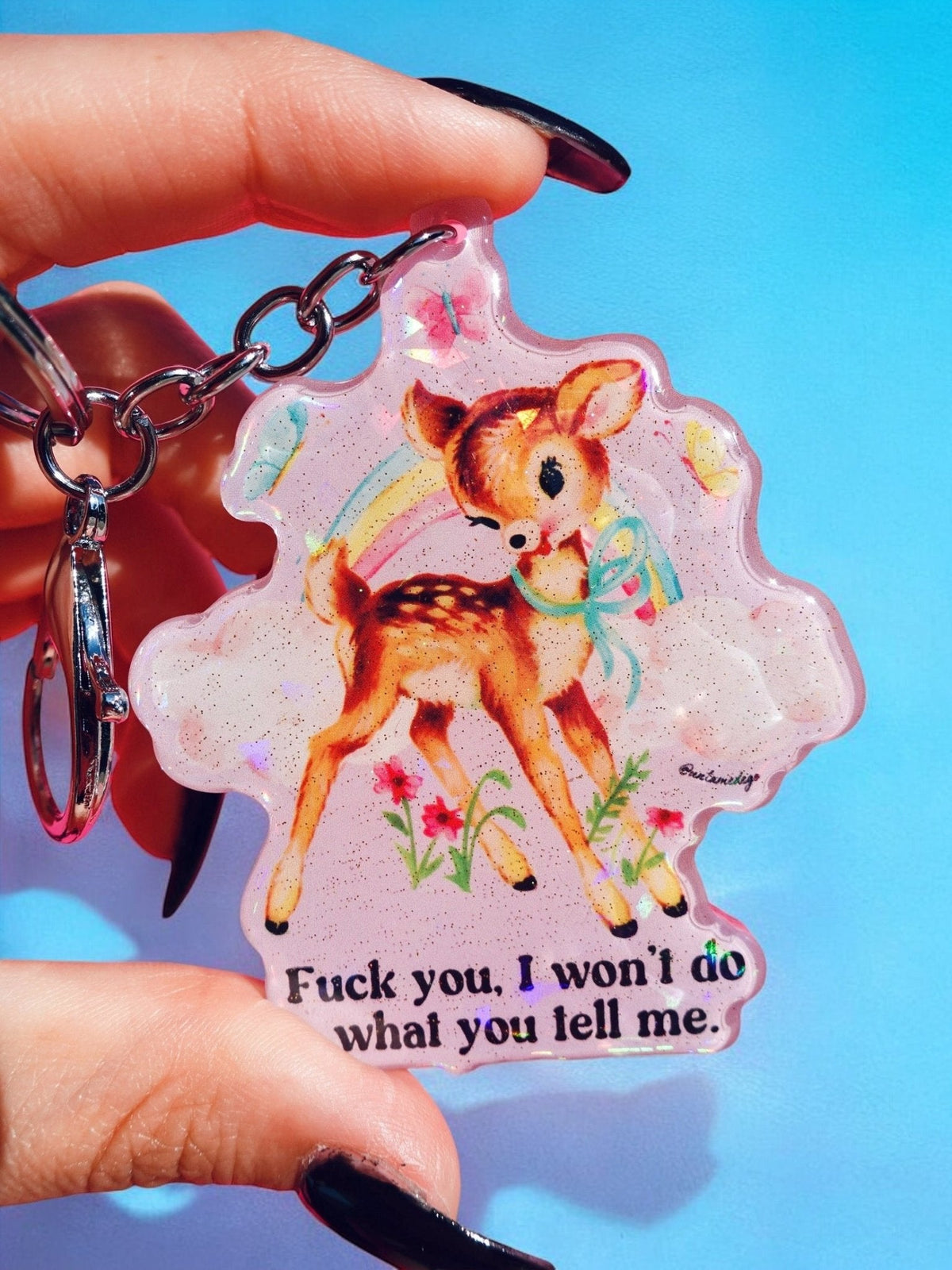 Funny Holographic fawn keychain charm with text “Fuck you, I won't do what you tell me.”