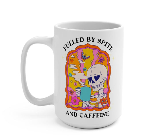 Funny "Fueled By Spite And Caffeine" — White coffee mug with colorful skull graphic and text: 'Fueled by Spite and Caffeine'.