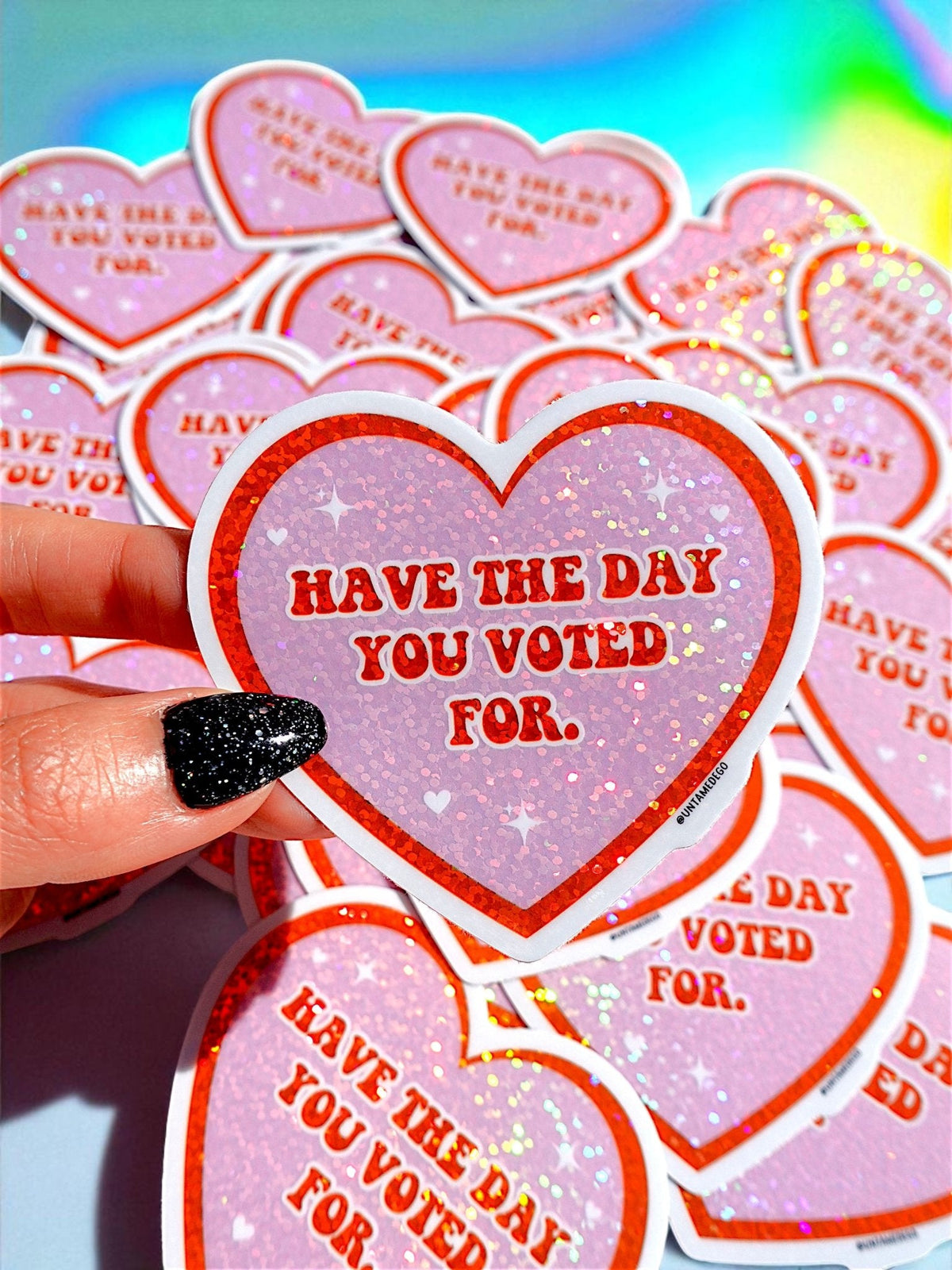 Funny Multiple heart-shaped vinyl stickers with glitter purple design and text “Have the day you voted for.”