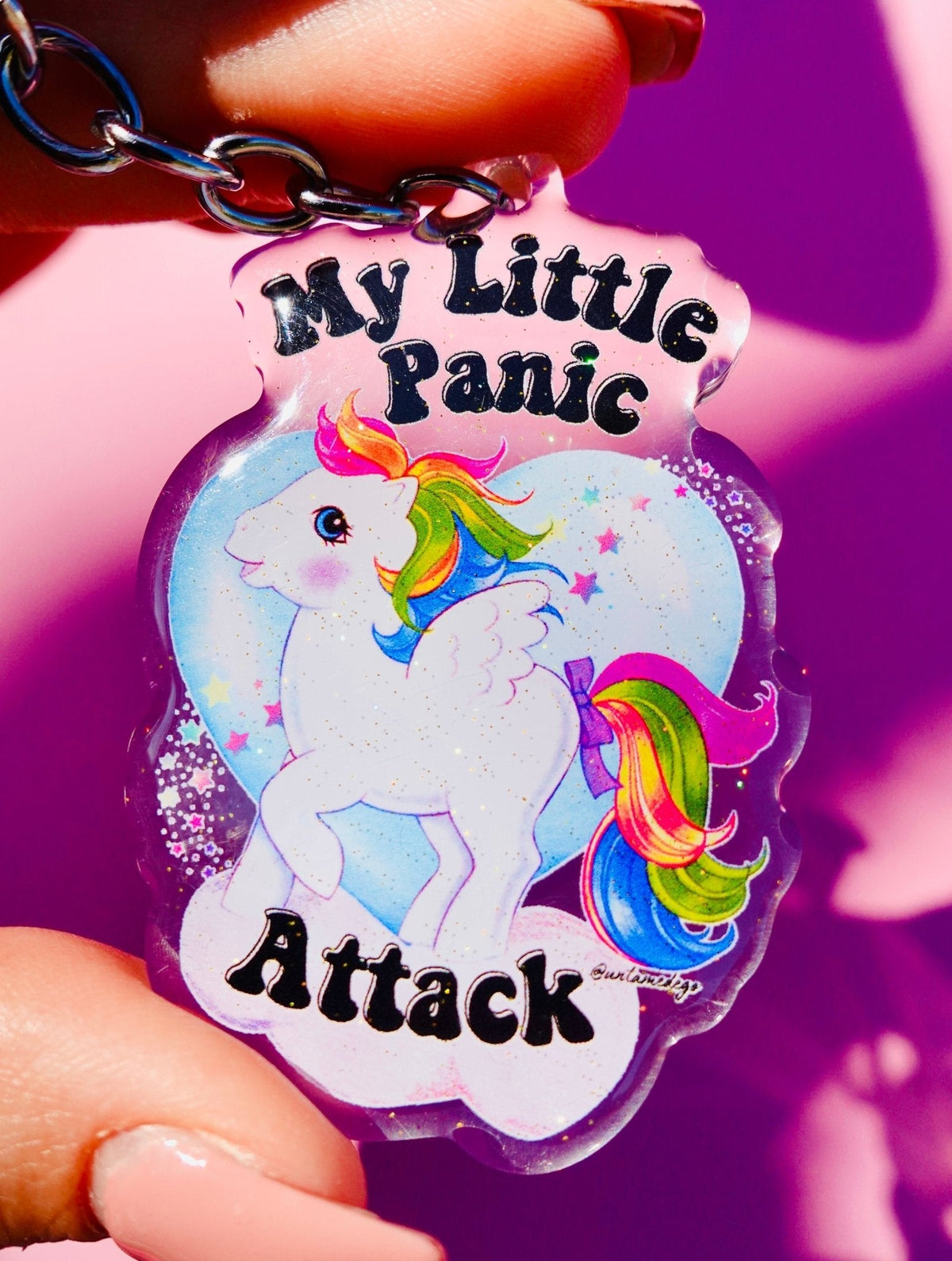 Funny Unicorn acrylic keychain charm with rainbow mane and playful text, on metal ring.