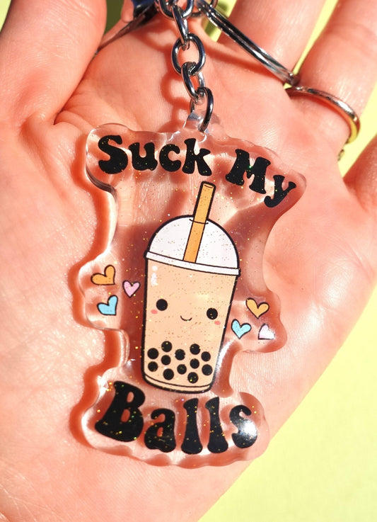 Funny Acrylic boba tea glitter keychain with 'Suck My Balls' text, cup, wavy red outline