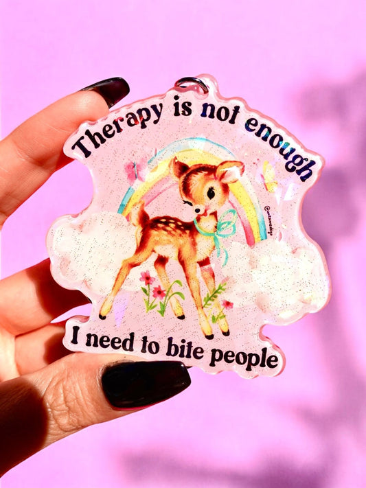 Funny Pink holographic dog keychain with phrase text, held in a hand by the metal ring
