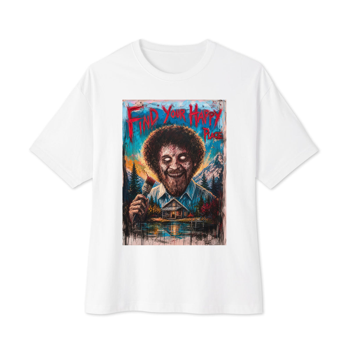White oversized boxy tee with the 'Find Your Happy Place' goth graphic: a zombie painter with a curly afro holding a paintbrush in front of a lakeside cabin, with the words "Find your happy place"