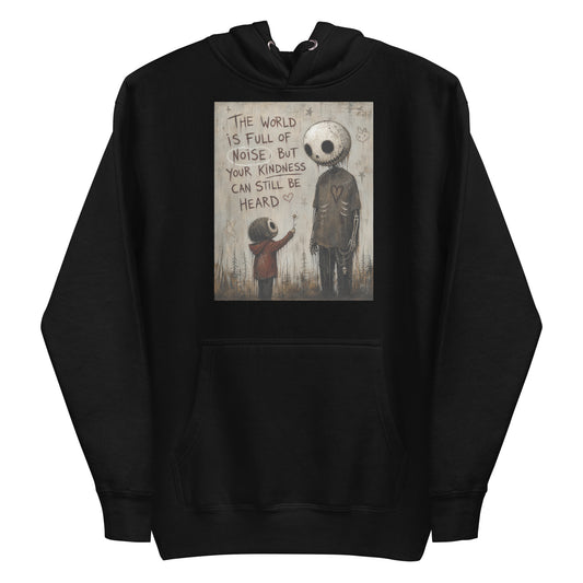 Black pullover hoodie with the 'Stay Kind' goth graphic: a tall skull-faced figure and a small child holding a flower, with the words "The world is full of noise, but your kindness can still be heard"