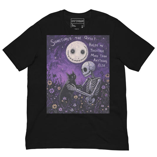 Black unisex t-shirt with the 'The Quiet Heals' goth graphic: a skeleton and a black cat in a purple flower field under a smiling moon, with the words "Sometimes the quiet holds me together more than anything else"