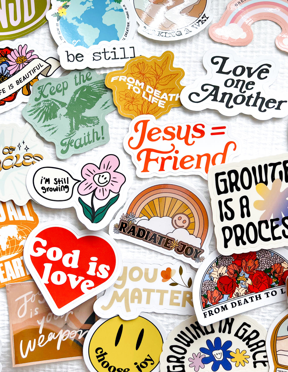 Variety of Elevated Faith Christian Stickers featuring inspiring messages and designs