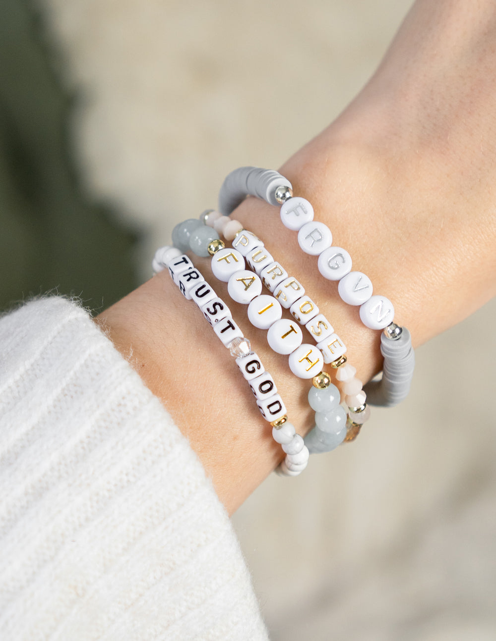 Elevated Faith Christian Jewelry Bracelet set featuring beads with inspirational words like Trust God and Faith