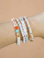 Elevated Faith Christian Jewelry Bracelet set featuring colorful letter beads spelling Grace, Revival, and Purpose