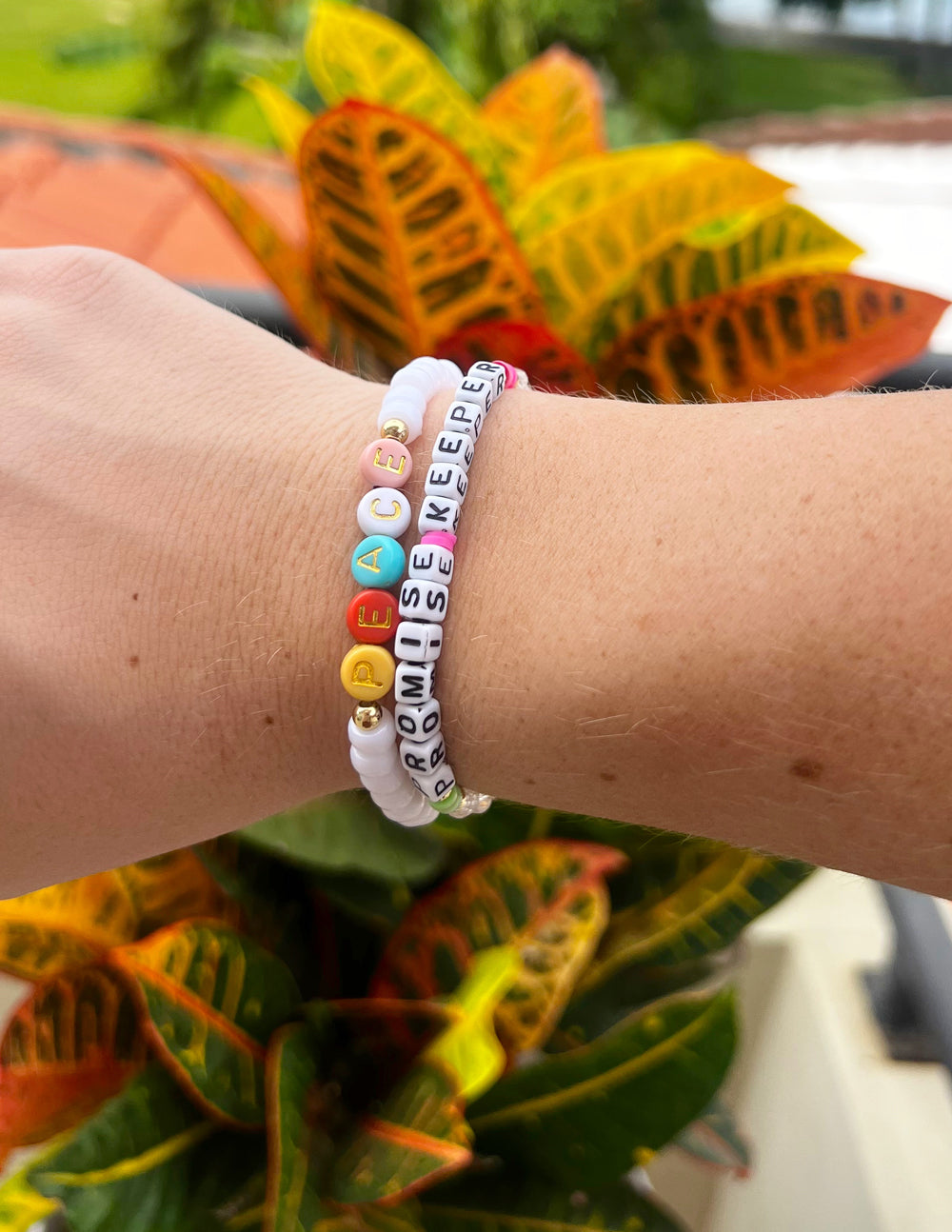 Elevated Faith Christian Jewelry Bracelet with colorful beads spelling peace and promise keeper