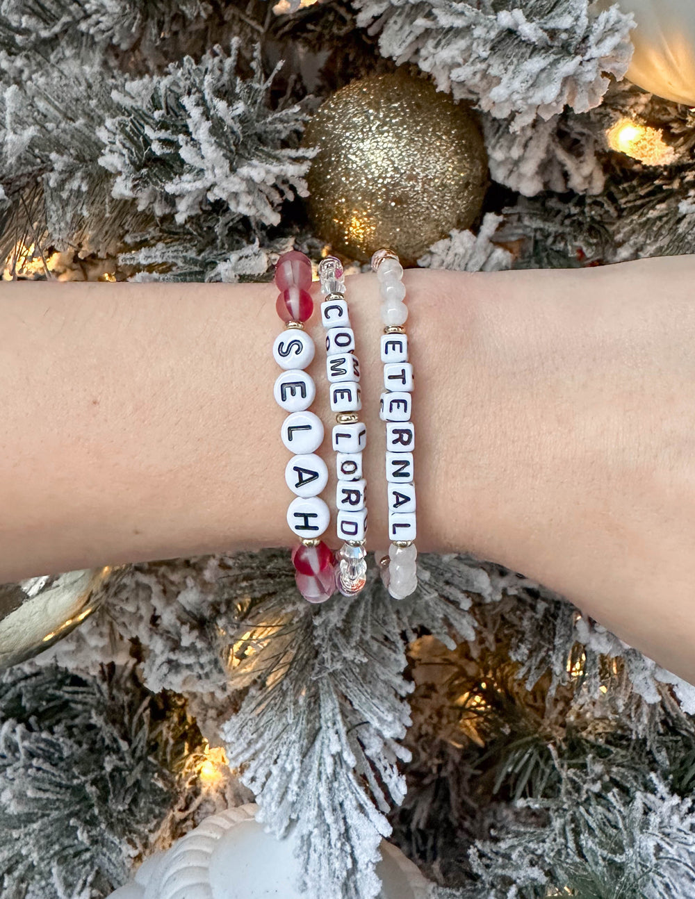 Elegant Elevated Faith Christian Jewelry Bracelet with letters SELAH, COME, and LORD on a charming wrist display