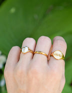 Three stylish rings from Elevated Faith featuring unique designs in gold, perfect for Christian Jewelry lovers