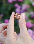 Elevated Faith Christian Jewelry Ring with 'Heaven Made' engraving, elegantly displayed between flowers