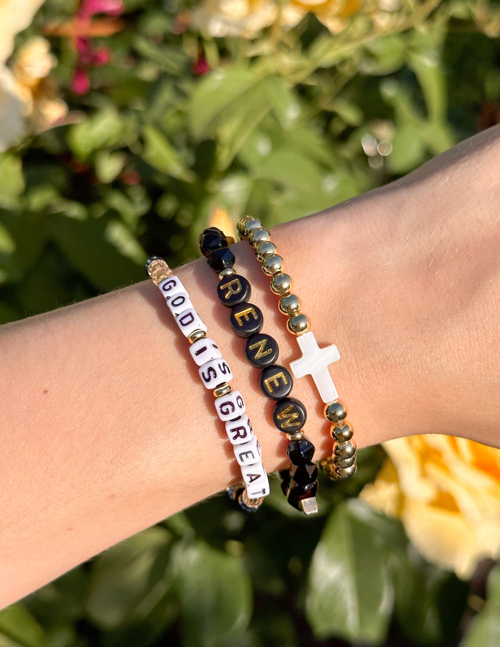 Elevated Faith Christian Jewelry Bracelet featuring beads with messages and a cross design
