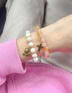 Elevated Faith Christian Jewelry Bracelet featuring stone beads with a cross and dove charms