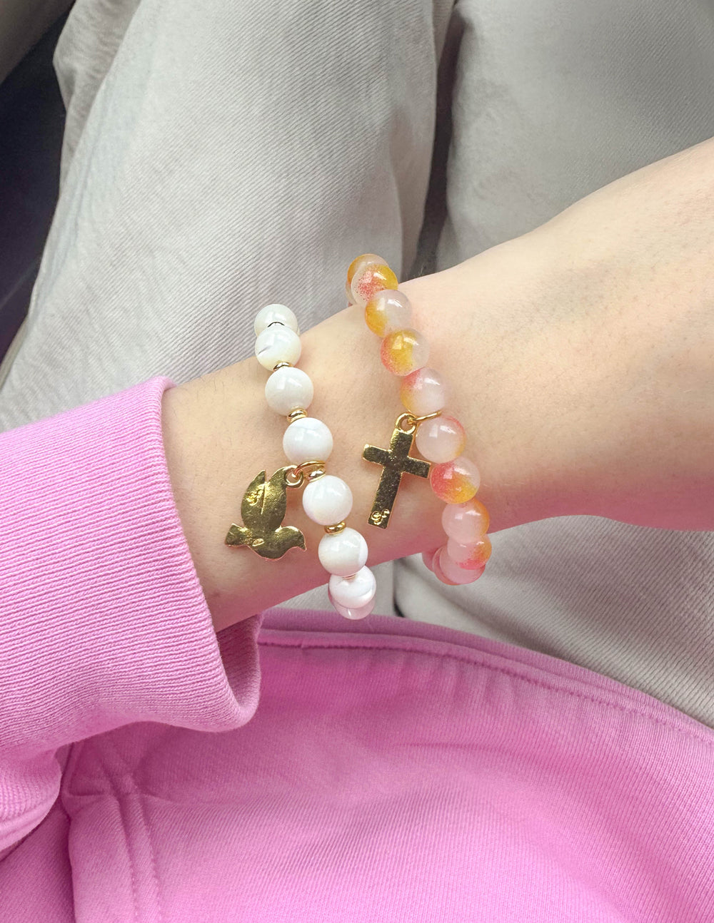Elevated Faith Christian Jewelry Bracelet featuring stone beads with a cross and dove charms