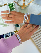 Fashionable Elevated Faith Christian Jewelry Bracelet on hands with colorful beaded designs for everyday wear