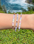 Elevated Faith Christian Jewelry Bracelet set with letters spelling Prosper, Heart of Gold, and Miracles