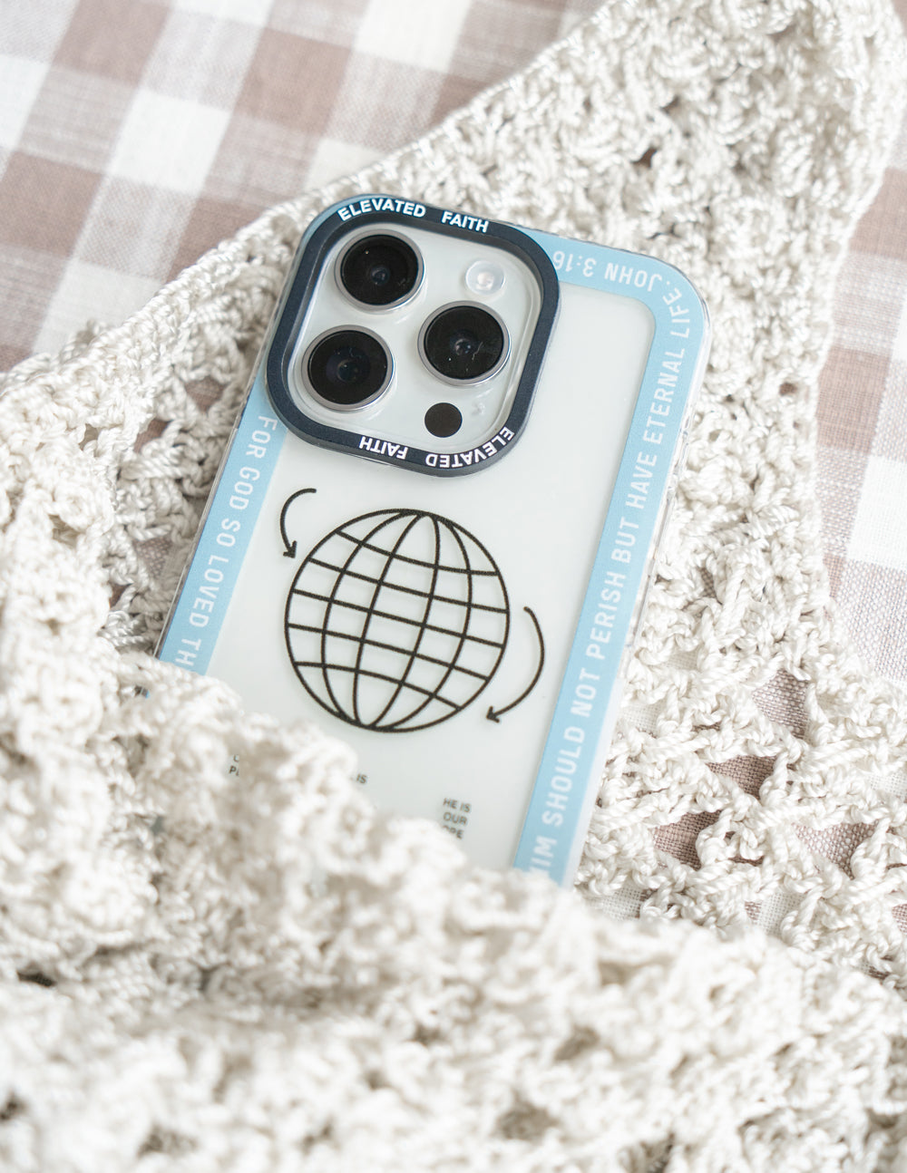 Elevated Faith Christian iPhone Case with globe design for stylish protection and faith expression