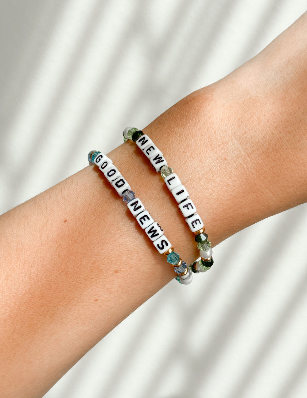 Elevated Faith Christian Jewelry Bracelet with colorful beads spelling 'Good News', 'New Life'
