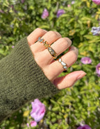 Elegant Elevated Faith rings displayed on a hand, perfect for Christian Jewelry lovers