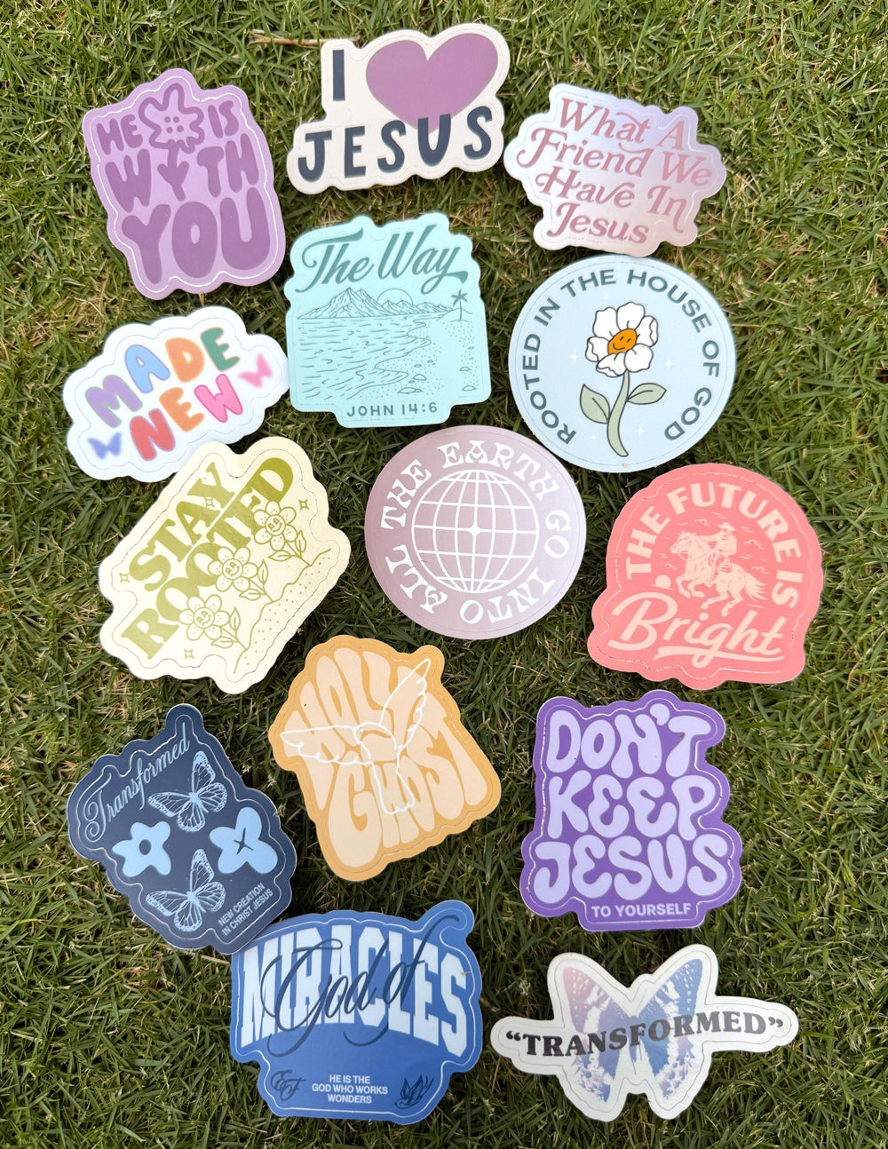 Variety of colorful Christian Stickers featuring uplifting messages and divine themes
