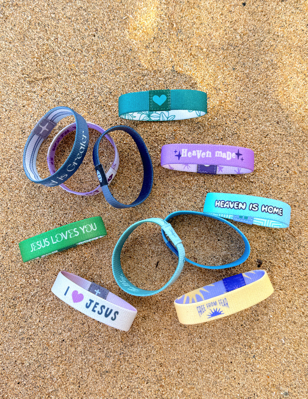 Assorted Christian Jewelry Bracelet designs featuring inspirational messages and colorful patterns