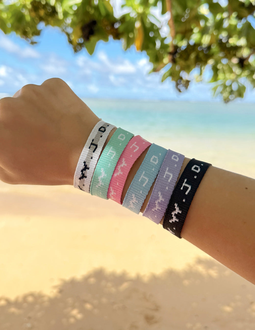 Colorful Elevated Faith Christian Jewelry Bracelet with inspirational messages displayed on vibrant wristbands