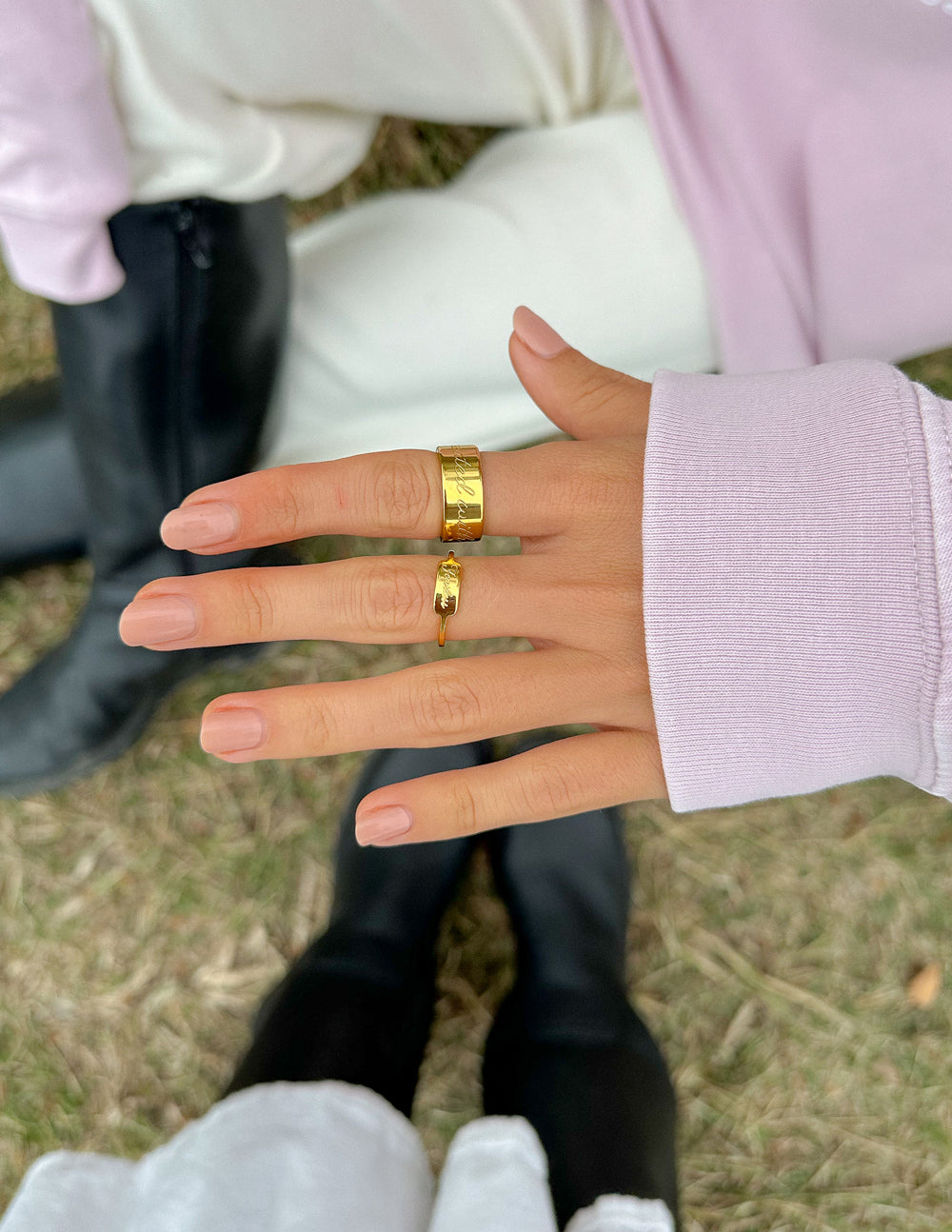 Elevated Faith Gold Ring on Model's Hand, a Stylish Piece of Christian Jewelry for Everyday Wear