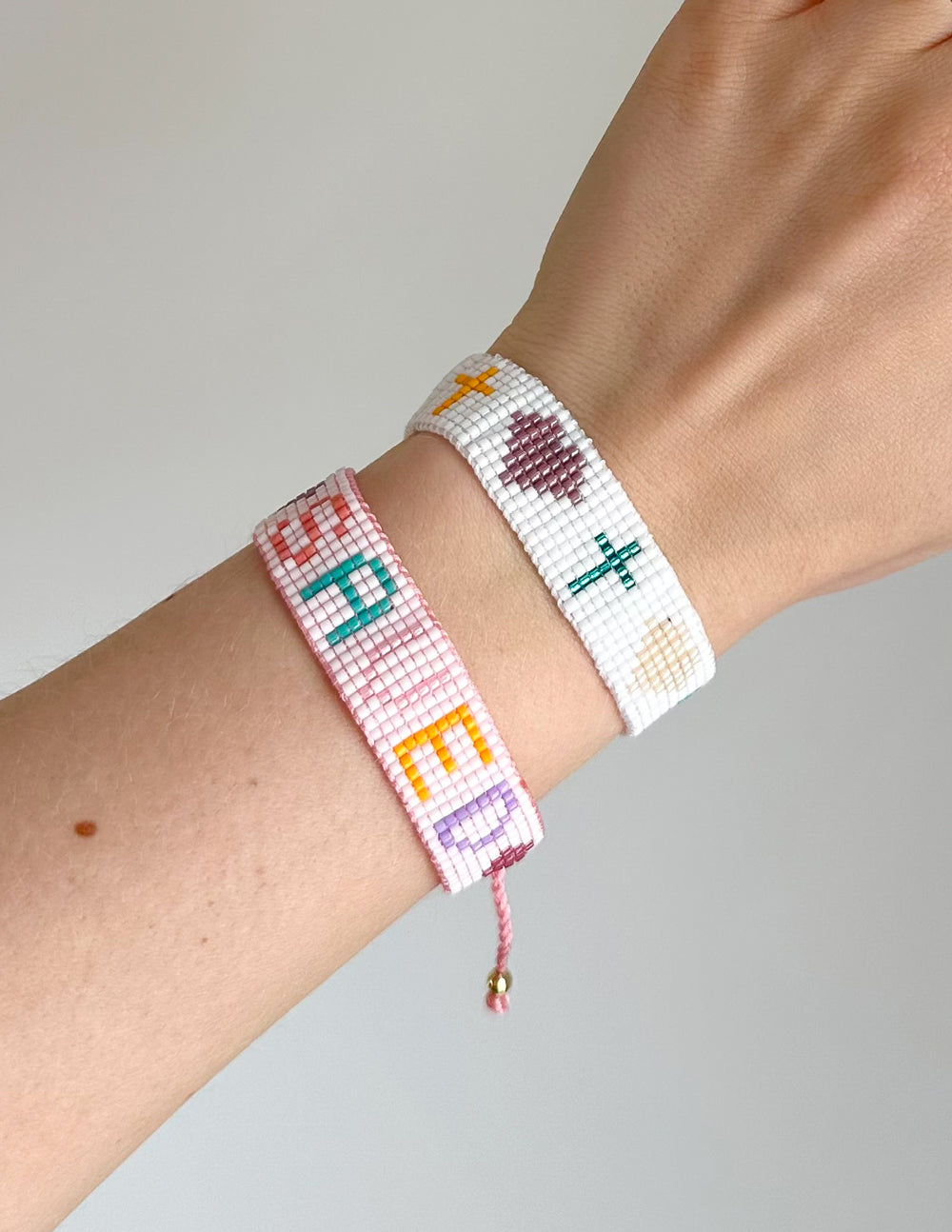 Elevated Faith Christian Jewelry Bracelet with colorful letters and symbols for stylish faith expression