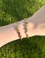 Elevated Faith Christian Jewelry Bracelet with gold letters spelling faith on a beaded design