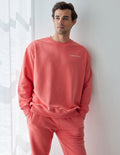 Elevated Faith Christian Crewneck Sweatshirt in vibrant coral color for casual comfort and style