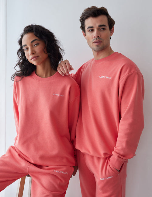 Elevated Faith Christian Crewneck Sweatshirt in coral color for stylish and comfortable wear