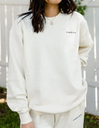 Elevated Faith Christian Crewneck Sweatshirt in soft cream color, perfect for casual wear and comfort
