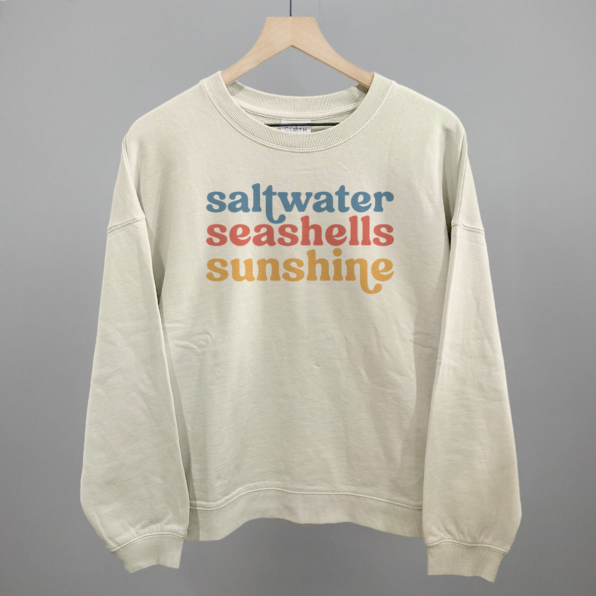 Saltwater, Seashells, Sunshine Beach graphic oversized boxy crew in Bone