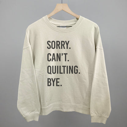 Sorry Can't Quilting Bye graphic oversized boxy crew in Bone
