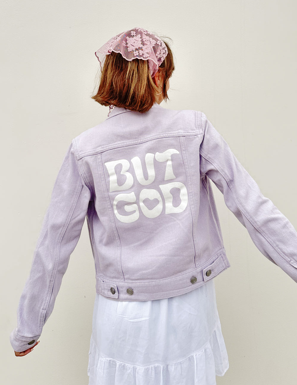 Lilac Elevated Faith Christian Jacket featuring a bold 'But God' graphic on the back