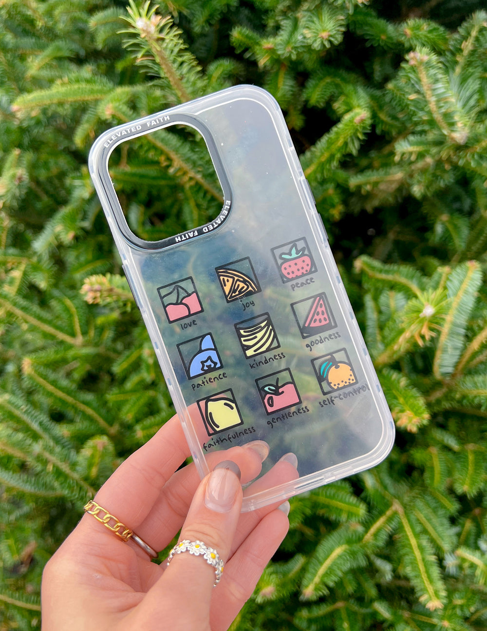 Elevated Faith Christian iPhone Case featuring uplifting symbols like love, peace, and kindness