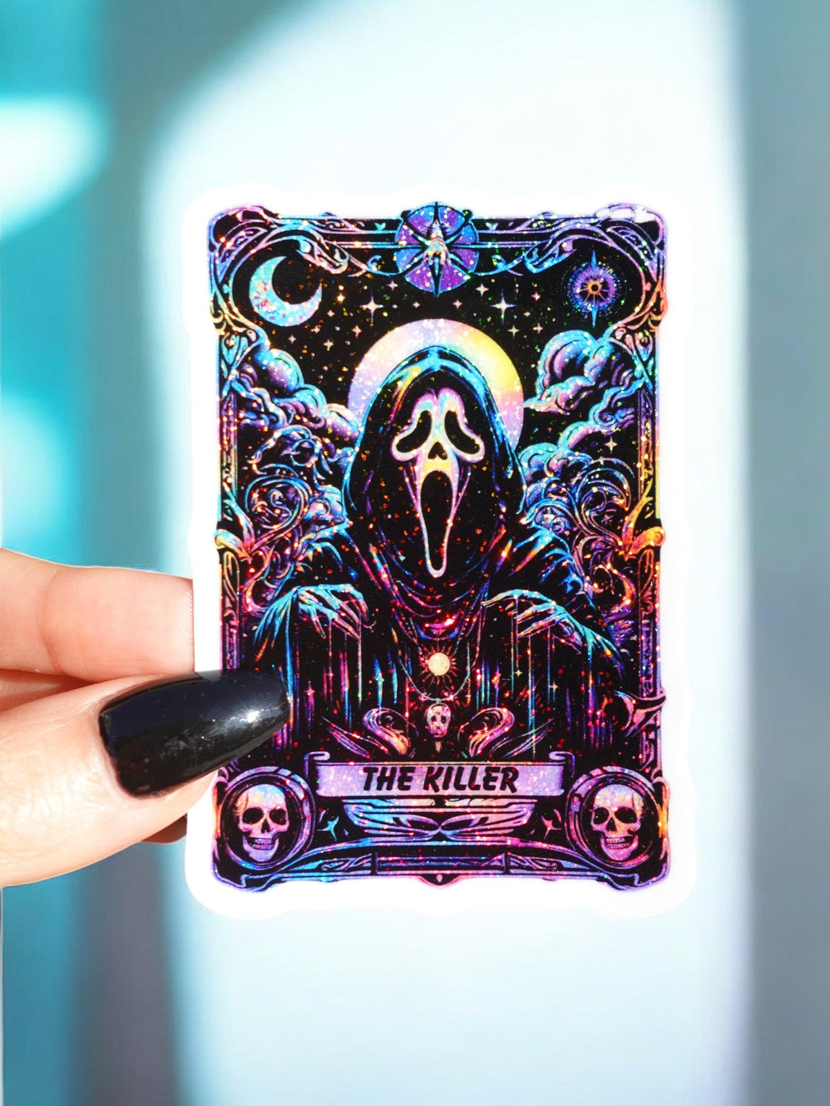 Funny Halloween tarot sticker with hooded skull figure, starry purple/gold art, THE KILLER text.