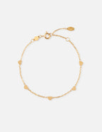 Elevated Faith Christian Jewelry Bracelet with delicate gold chain and heart charms for faith-inspired style