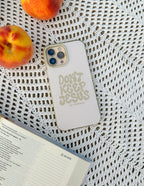Christian iPhone Case with the message Don't Keep Jesus to Yourself on a textured surface