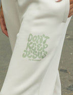 Elevated Faith sweatpants with 'Don't Keep Jesus to Yourself' design, perfect for Christian Apparel enthusiasts