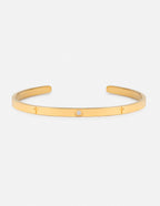 Elevated Faith Gold Cuff Bracelet with a Cross and a Sparkling Stone, stylish Christian Jewelry Bracelet