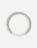 Elevated Faith Christian Jewelry Bracelet with white letter beads spelling FRGVN on a grey beaded band