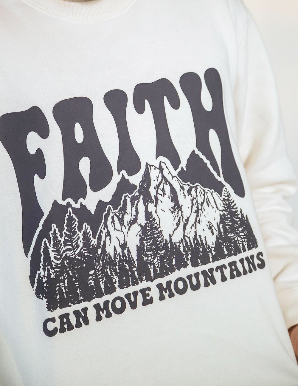 Elevated Faith Christian Crewneck Sweatshirt featuring a mountain graphic and inspirational text