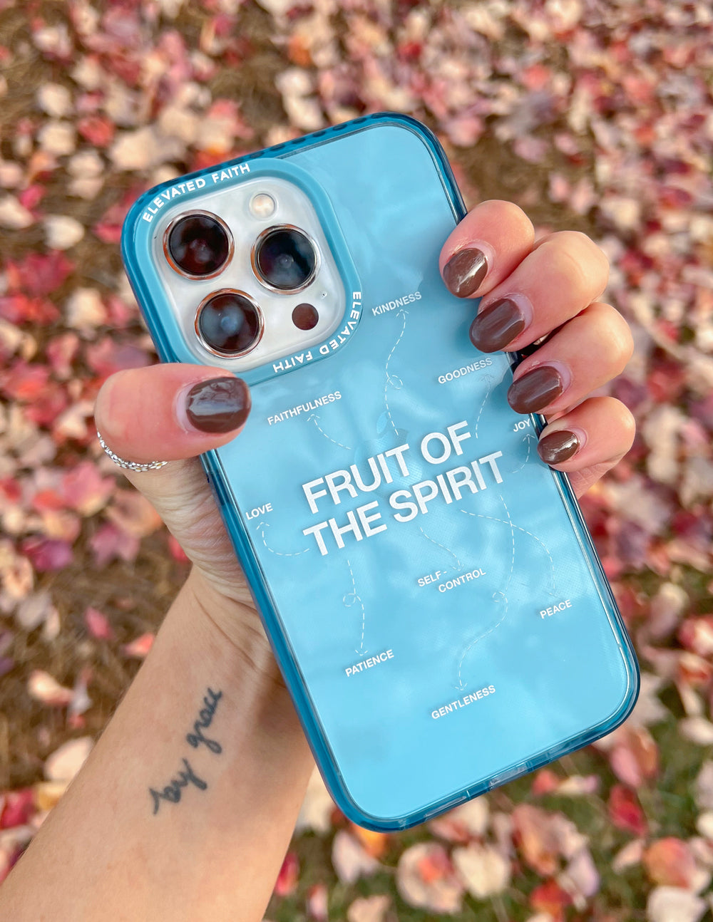 Elevated Faith Christian iPhone Case featuring the Fruit of the Spirit design in blue with inspirational words