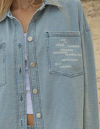 Elevated Faith Christian Jacket in denim with embroidered words depicting love, joy, peace, and kindness