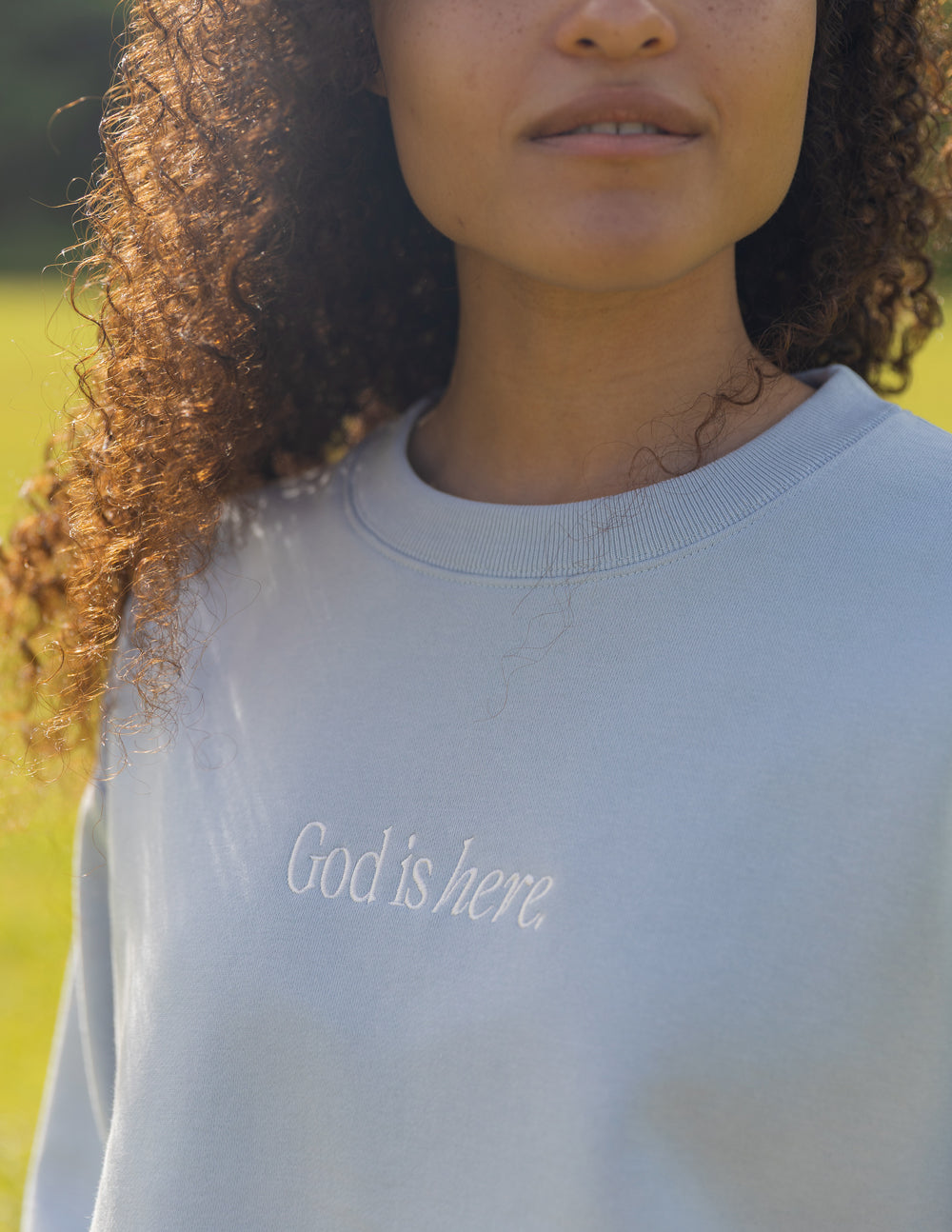 Light Blue Christian Crewneck Sweatshirt with 'God is here' embroidered design